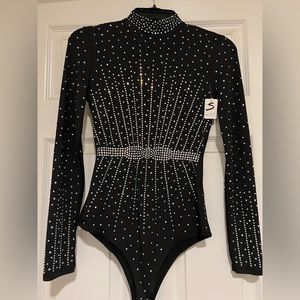 Long sleeve beaded bodysuit. New. Size small.